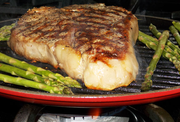 Grilling Porterhouse steak with asparagus