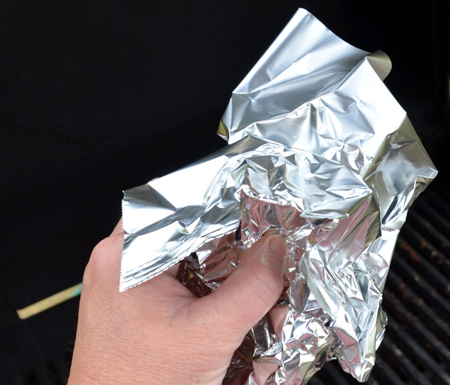 In a hurry? Clean your grill with a wad of aluminum foil.