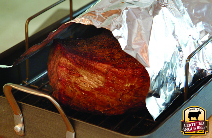 Tent beef with foil and allow it to rest for several minutes. This allows the juices to be absorbed back into the meat for a juicier bite.