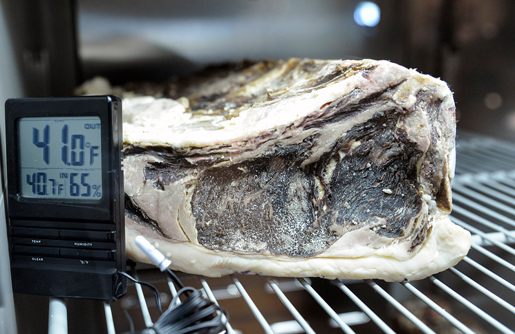 Beef in a dry aging cooler.