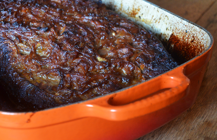 Barbecued brisket after four hours in the oven.