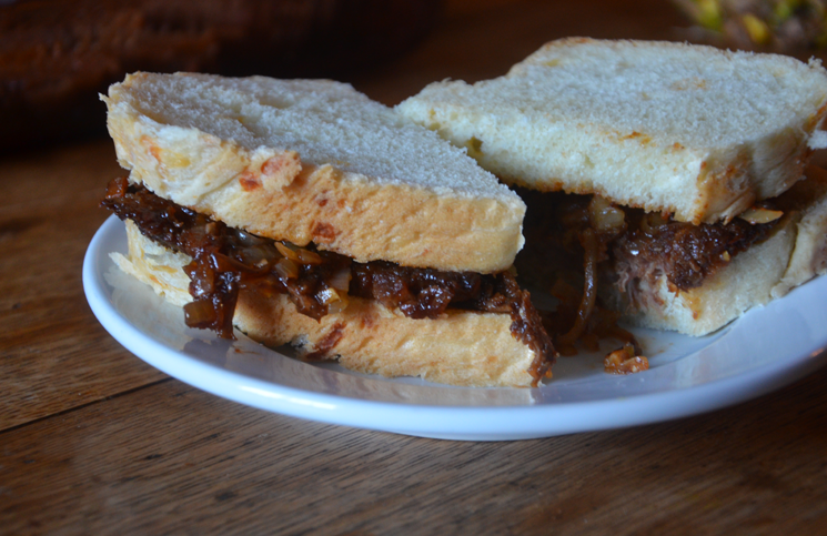 Brisket sandwich on Italian cheddar bread.