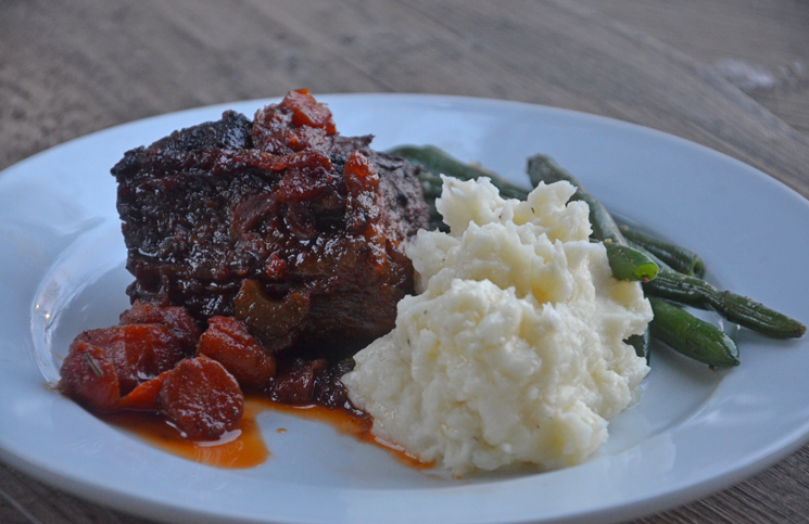 Red wine-braised beef short ribs make a rich, decadent dish, ideal for Valentine's Day or any occasion.