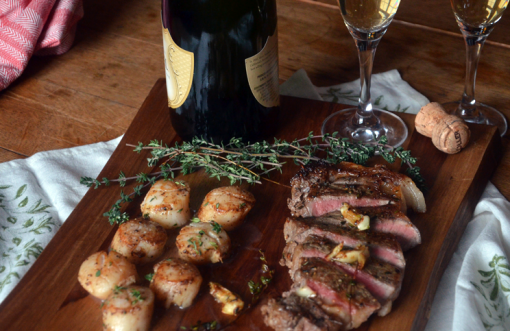 Valentine's Day Surf & Turf: scallops and strip steaks with champagne.