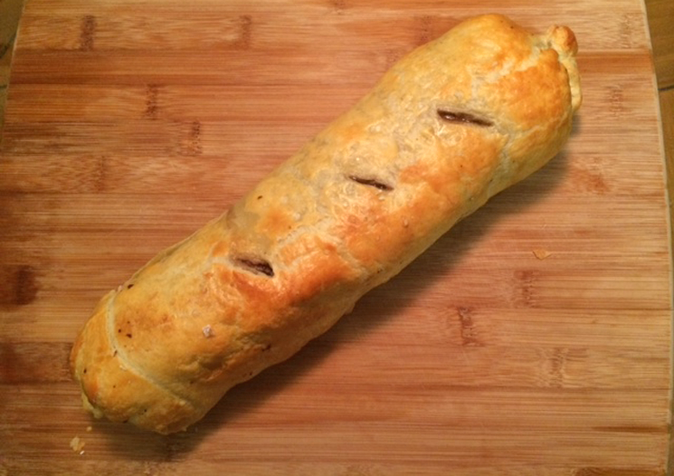 Beef Wellington in golden crust