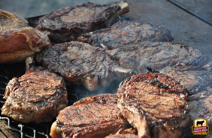 Cowboy steaks prepared on the open range by the chuck wagon cook.