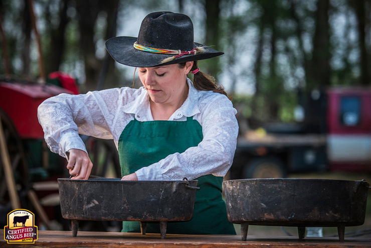 Shannon Rollins joins husband and chuck wagon cook, Kent Rollins, at a cowboy dinner for Certified Angus Beef.