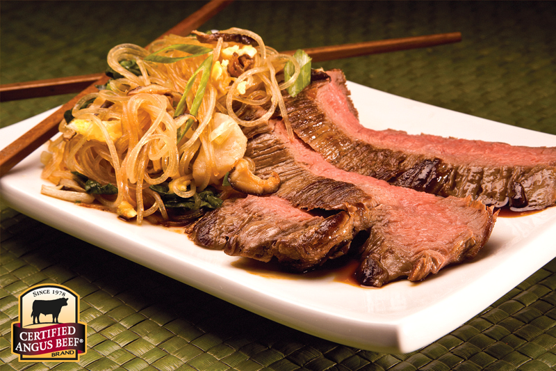 Flank steak with Asian noodles.